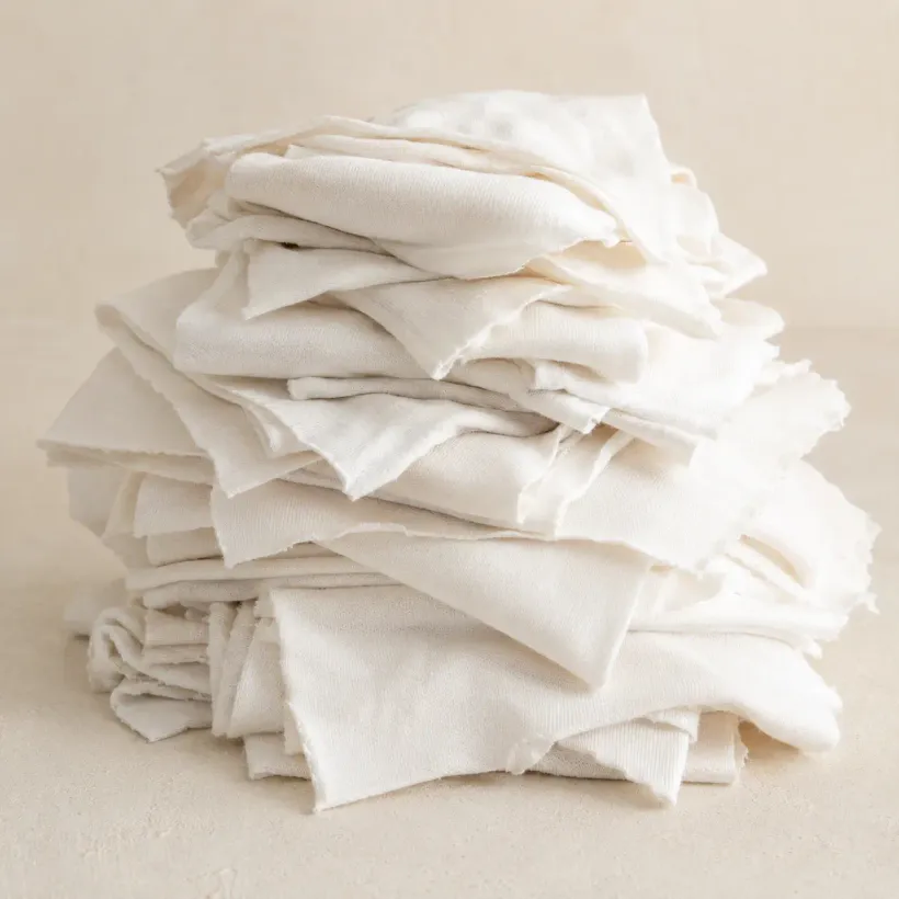 Folded white cotton knit rags